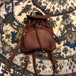 cutest lil brown faux leather mini backpack